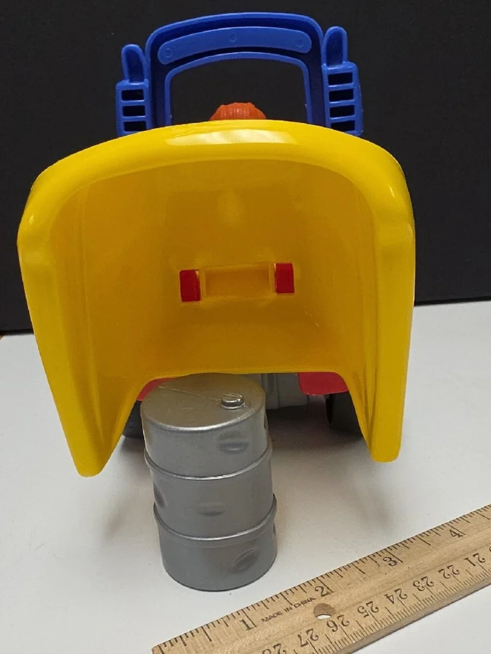 Fisher-Price Little People Red & Yellow Dump Truck with Figure And Accessory